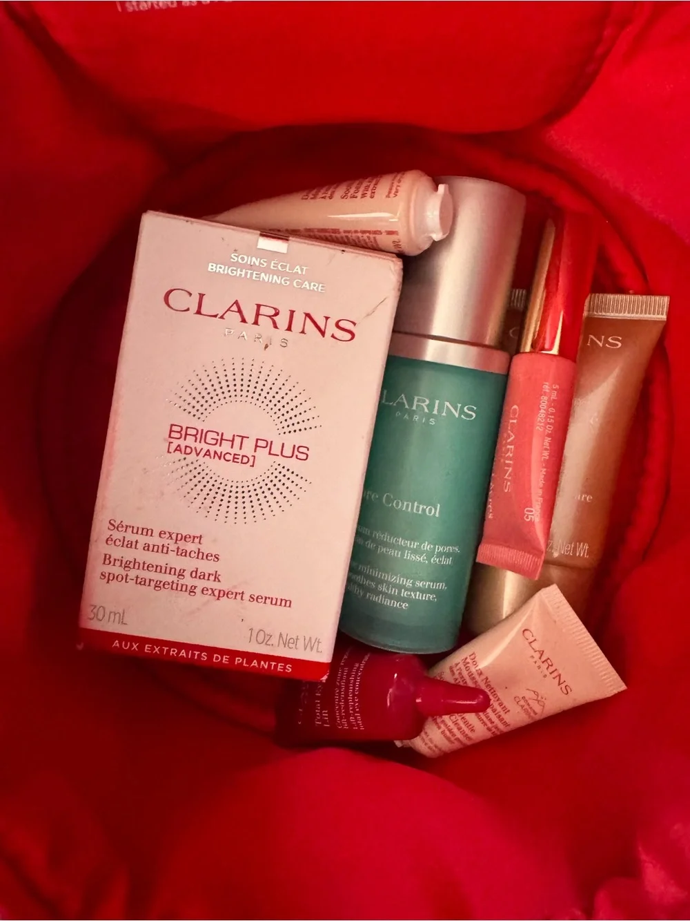 Clarins Skincare 7pc Set in red velvet travel bag NWOT